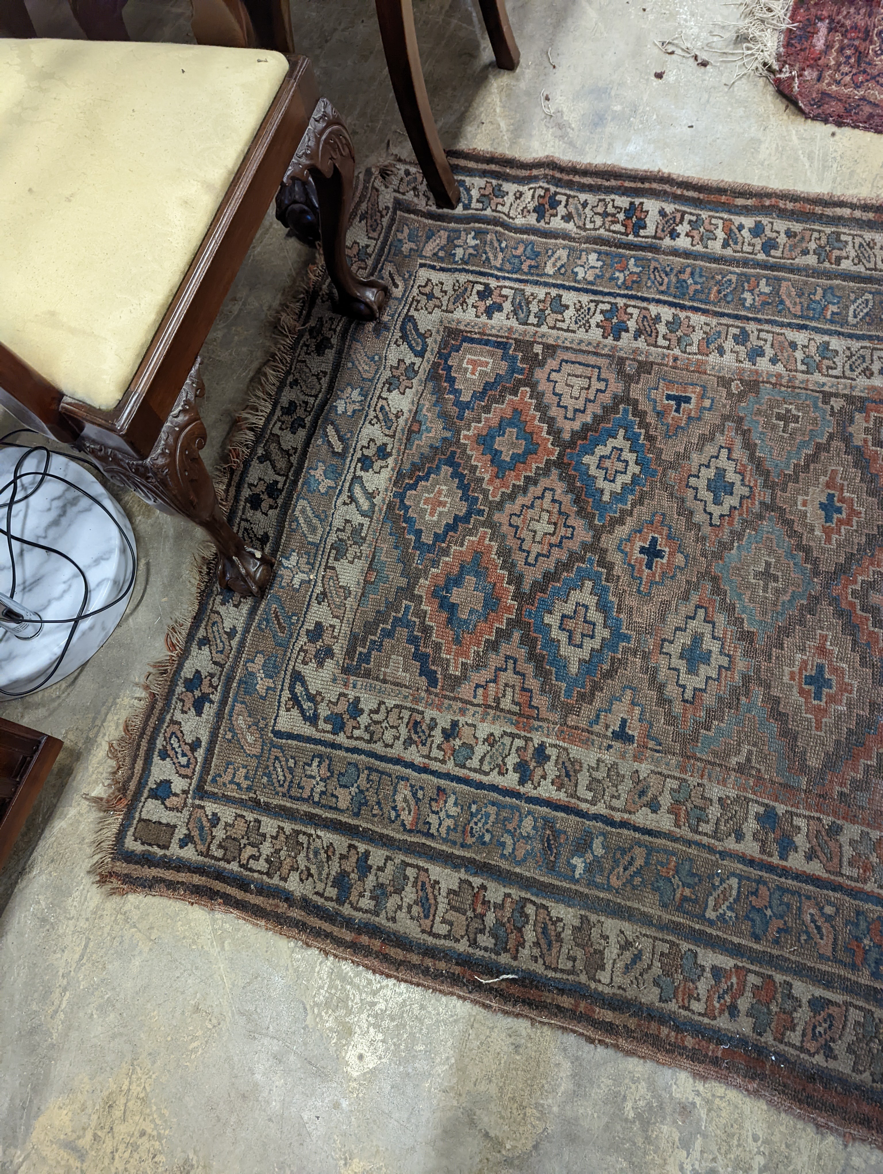 An antique Caucasian runner and a Belouch rug, larger 284 x 134cm